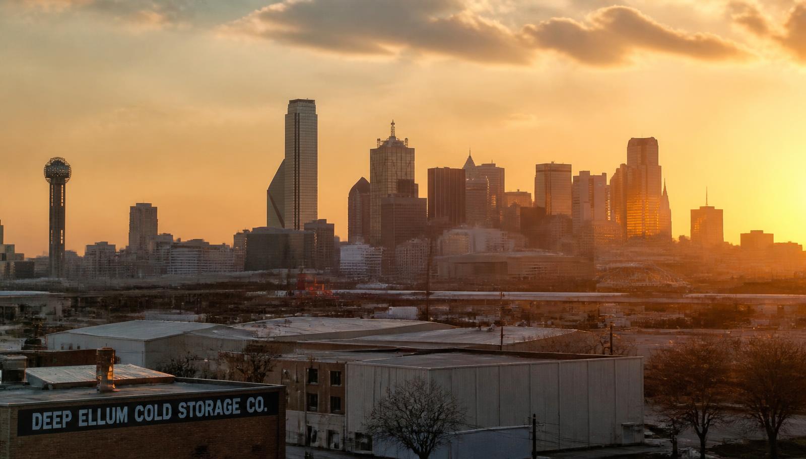 Dallas skyline at golden hour seen from the industrial district